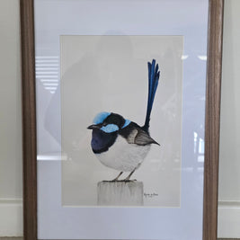 Framed artwork of a bird on a white background